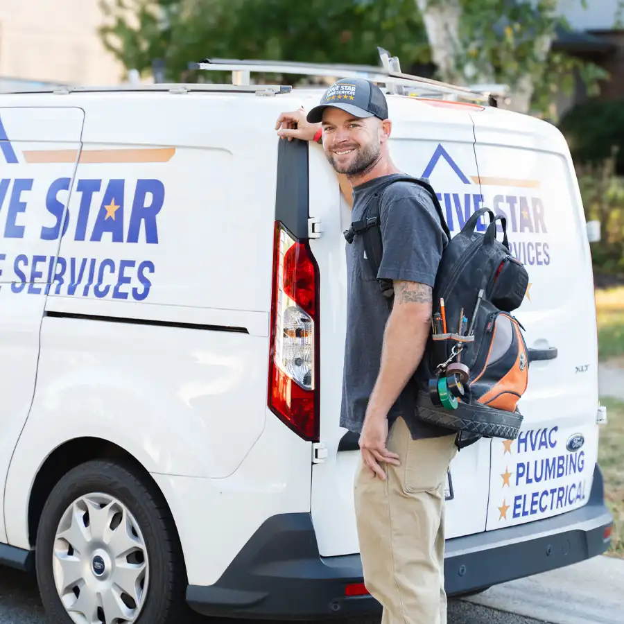 Plumbing with a backpack full of tools leaning on a Five Star Home Services van